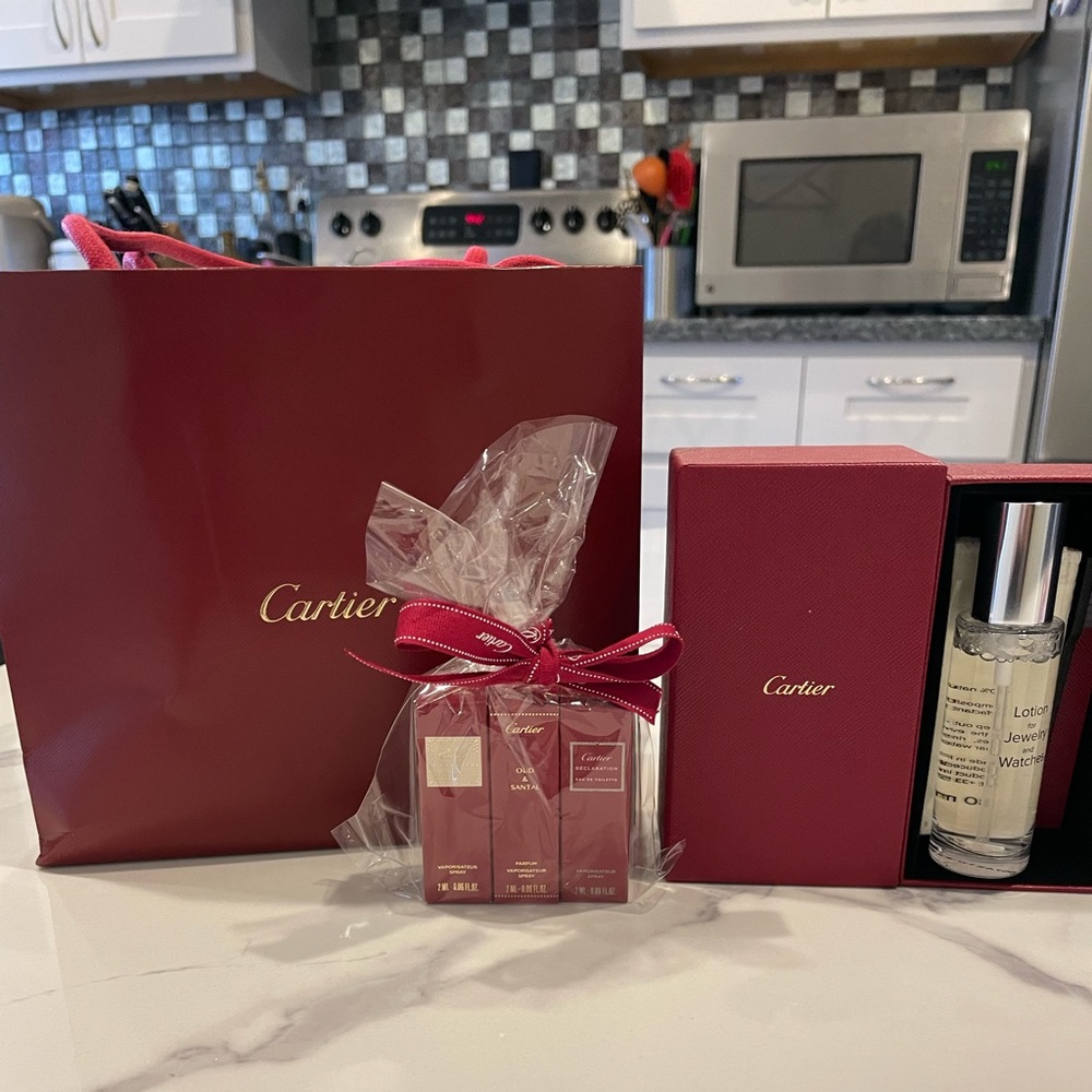 Cartier jewelry and watch cleaner with nag and perfume samples